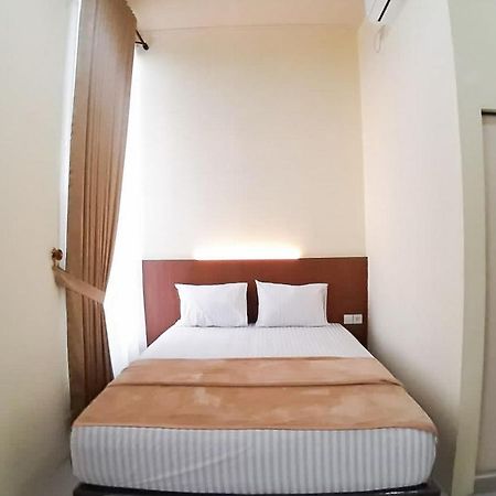 Отель Reddoorz Syariah Near Transmart Jambi 2 Paalmerah Экстерьер фото
