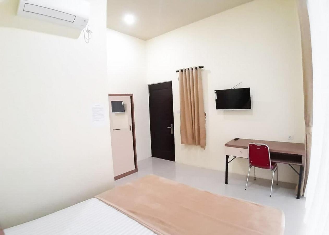 Отель Reddoorz Syariah Near Transmart Jambi 2 Paalmerah Экстерьер фото