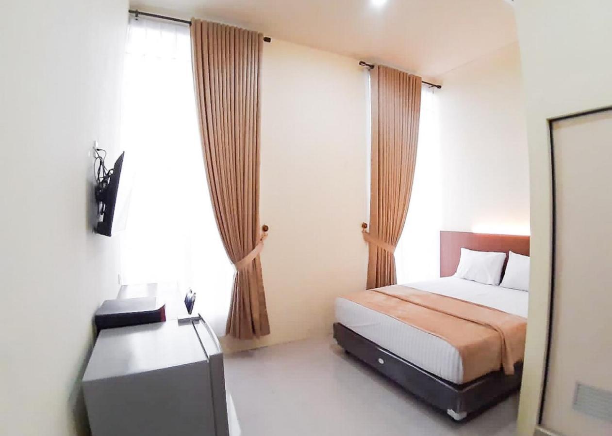 Отель Reddoorz Syariah Near Transmart Jambi 2 Paalmerah Экстерьер фото