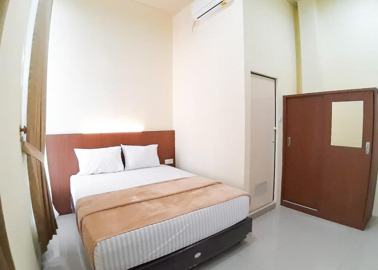 Отель Reddoorz Syariah Near Transmart Jambi 2 Paalmerah Экстерьер фото