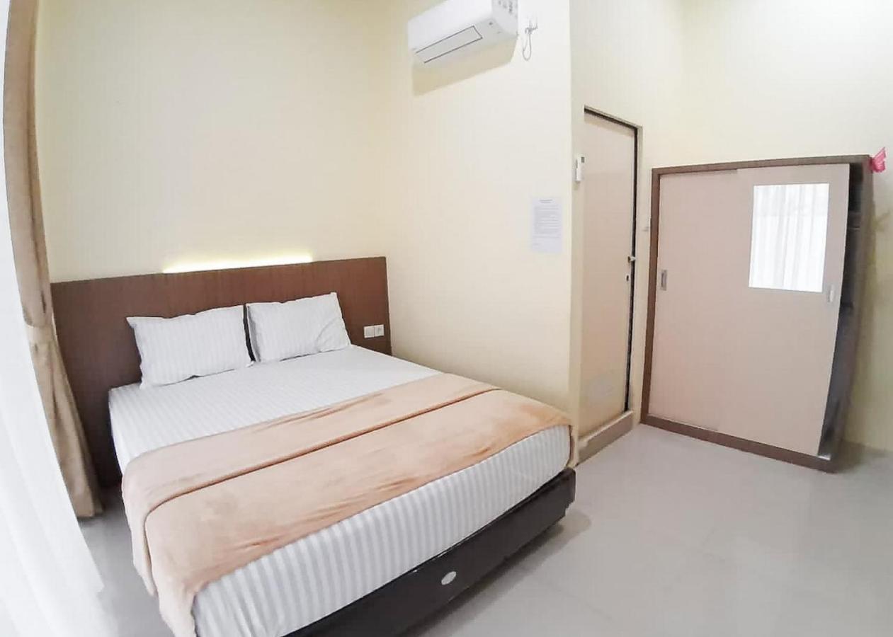 Отель Reddoorz Syariah Near Transmart Jambi 2 Paalmerah Экстерьер фото